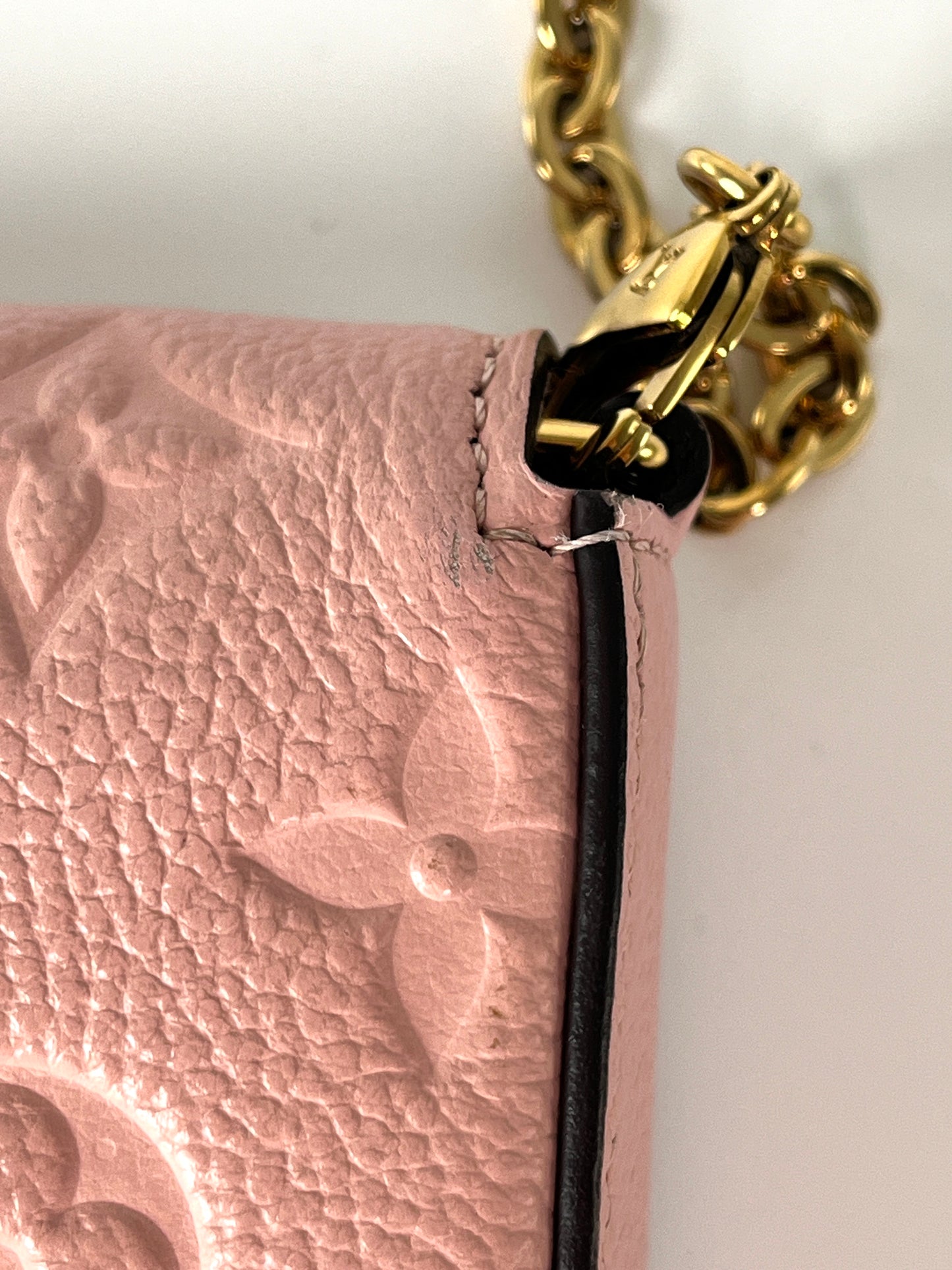 LOUIS VUITTON Felicie Rose Poudre Pink Monogram Empreinte Leather Pochette