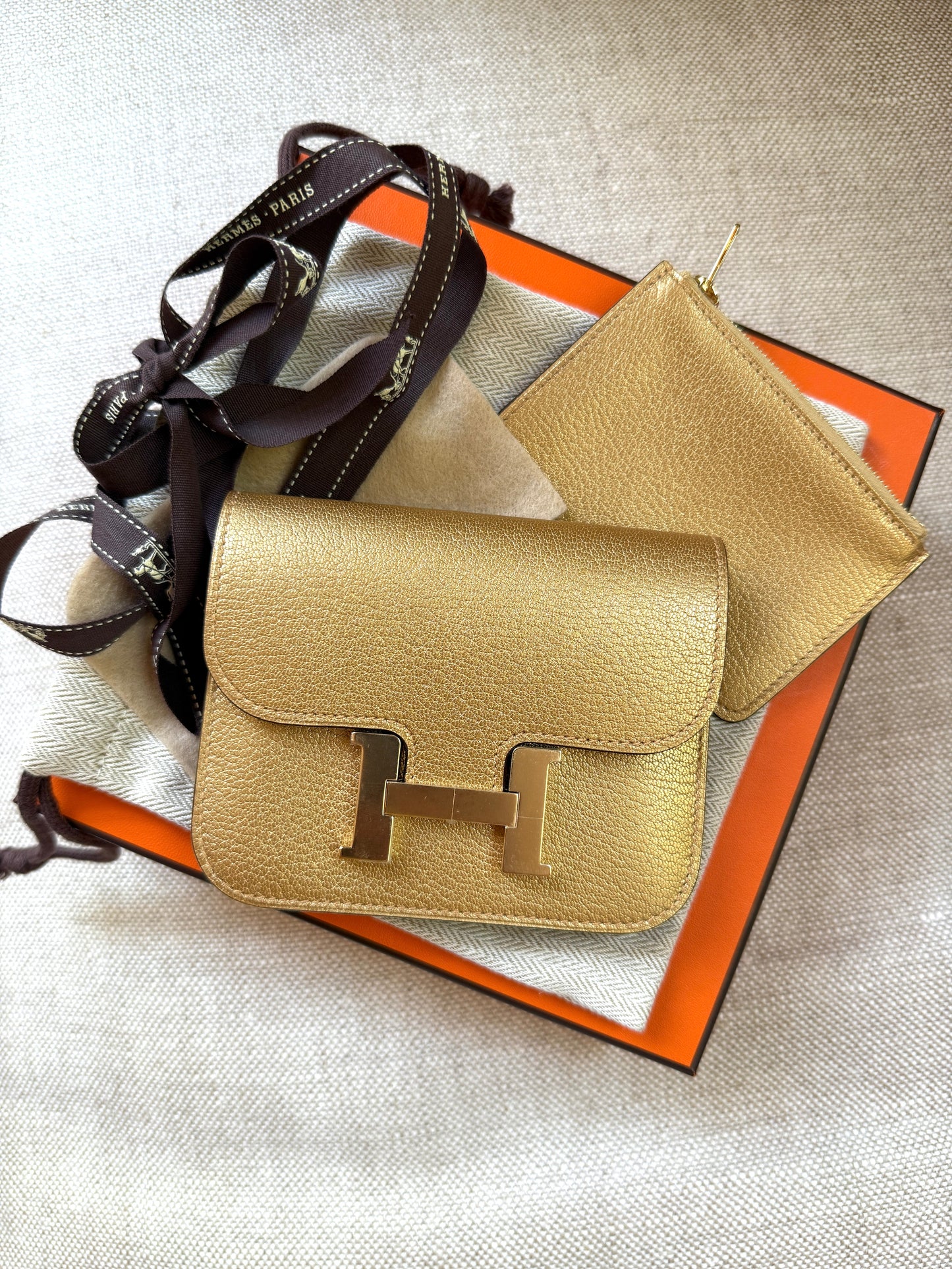 New HERMES Constance Slim Compact Dore Gold Chamkilight Goatskin Wallet Belt Bag