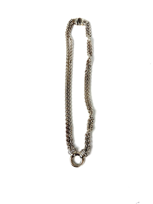 Designer: David Yurman
Length: 17”
Metal type: 925 sterling silver
Hallmark:  925, Designer signature
Item weight: 58g
Gemstone: 12 Diamonds, near colorless
Condition: Excellent. Light hairline scratches and discoloration at metal. Please see the photographs.
Inclusions: Pouch.
Retail price: $1350
Attach a DY Albion pendant to this necklace or wear it alone.  A classic piece of jewelry from David Yurman that will last for generations to come.
All items sold by Fashion Reloved are guaranteed authentic and