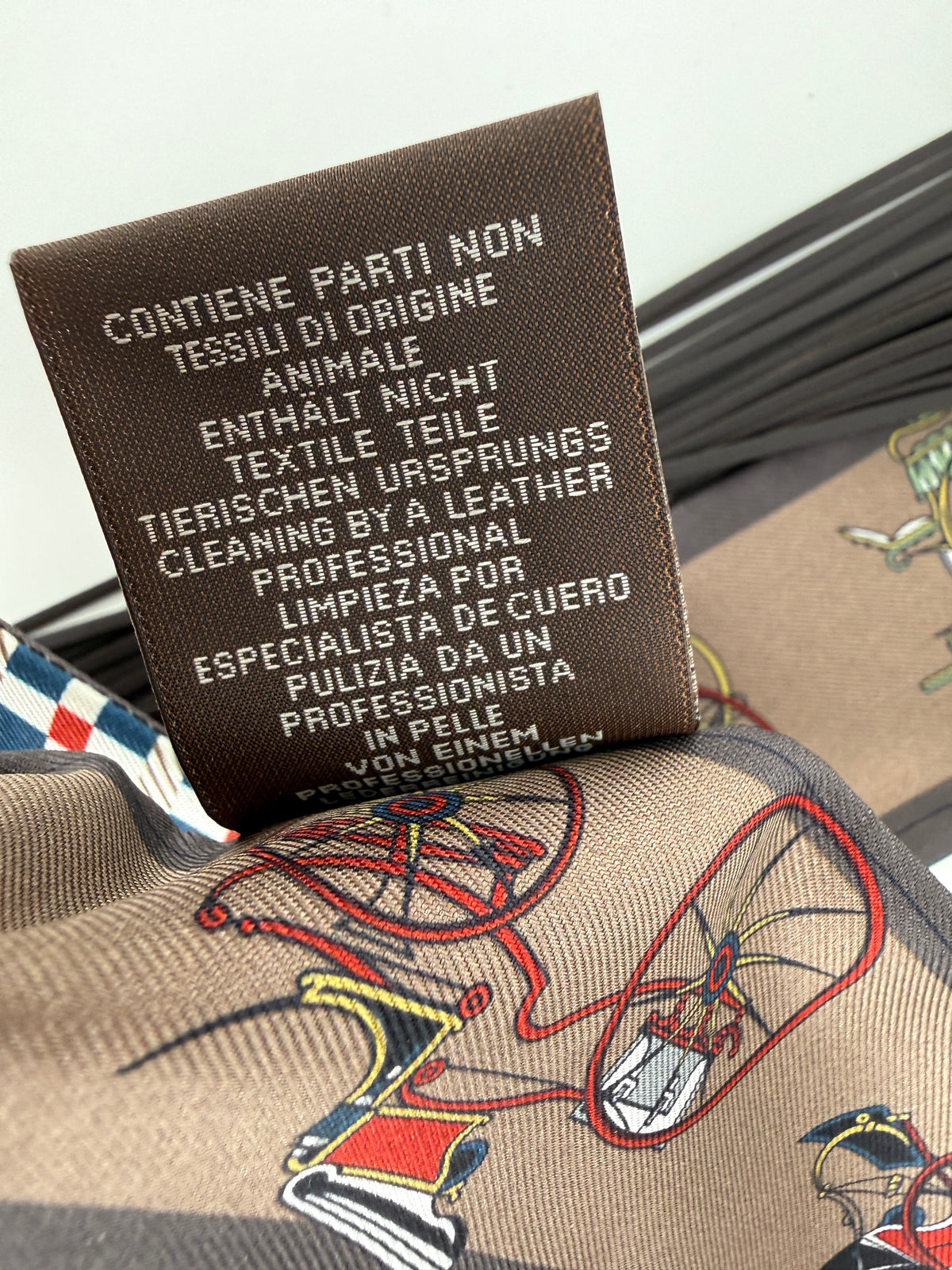 HERMES Les Voitures Nouvelles Bleu Rouge H Marron Glace Silk Calfskin Leather Fringes Twilly Scarf New