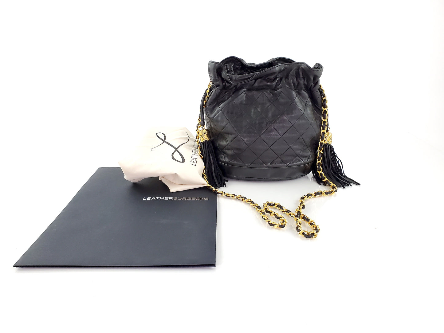 Vintage CHANEL 24k Gold Black Leather Quilted Bucket Bag