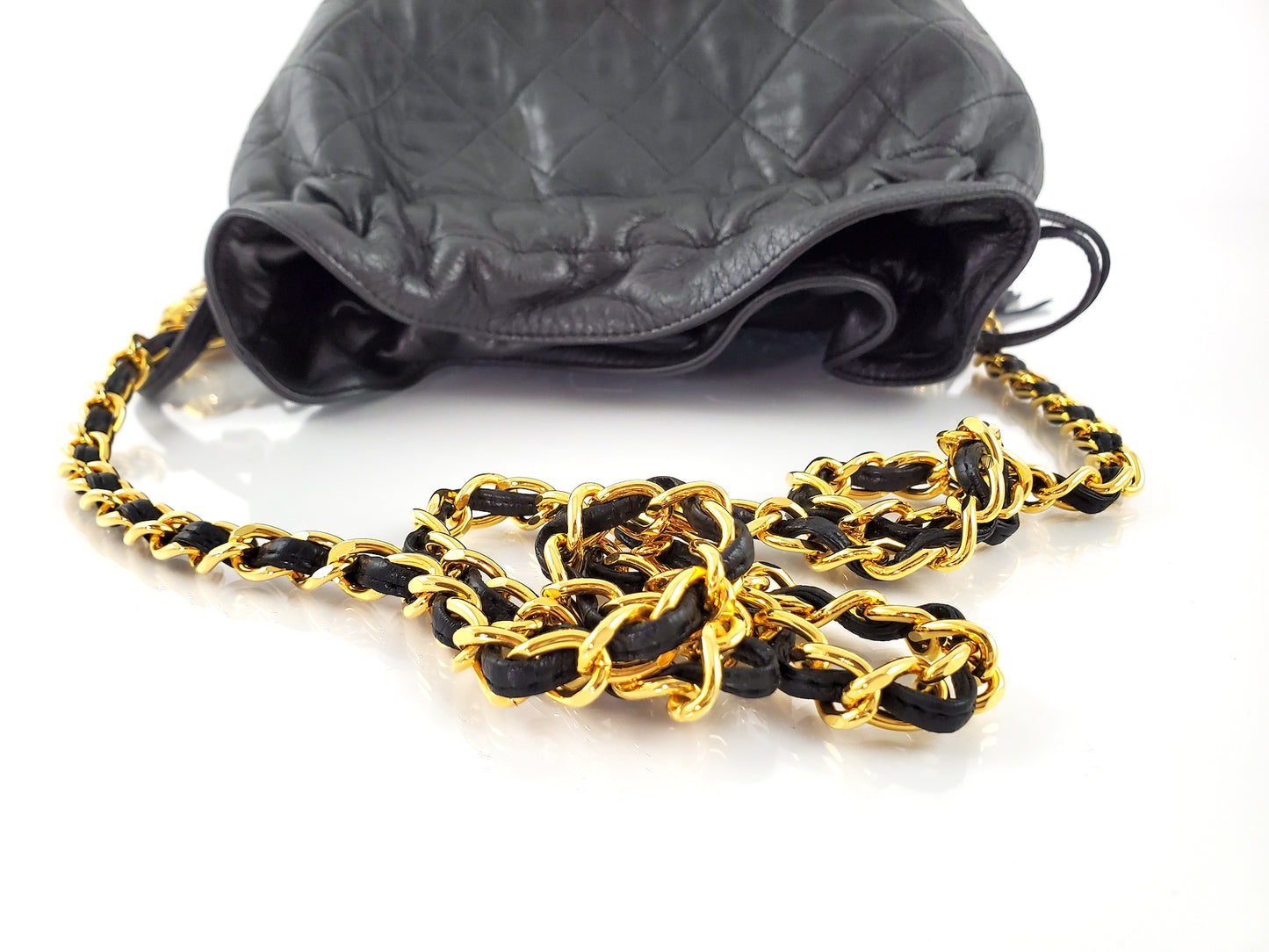 Vintage CHANEL 24k Gold Black Leather Quilted Bucket Bag