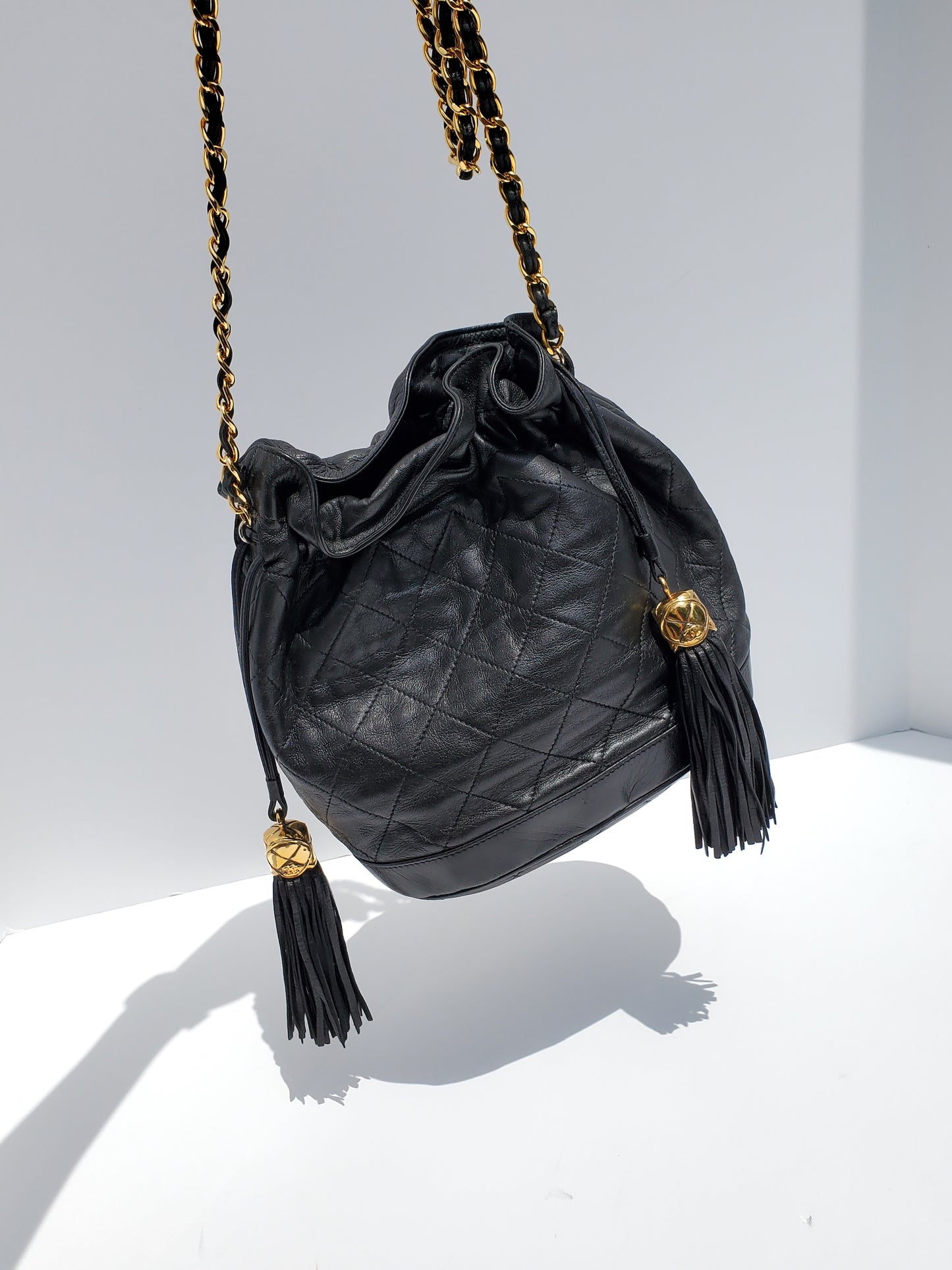 Vintage CHANEL 24k Gold Black Leather Quilted Bucket Bag