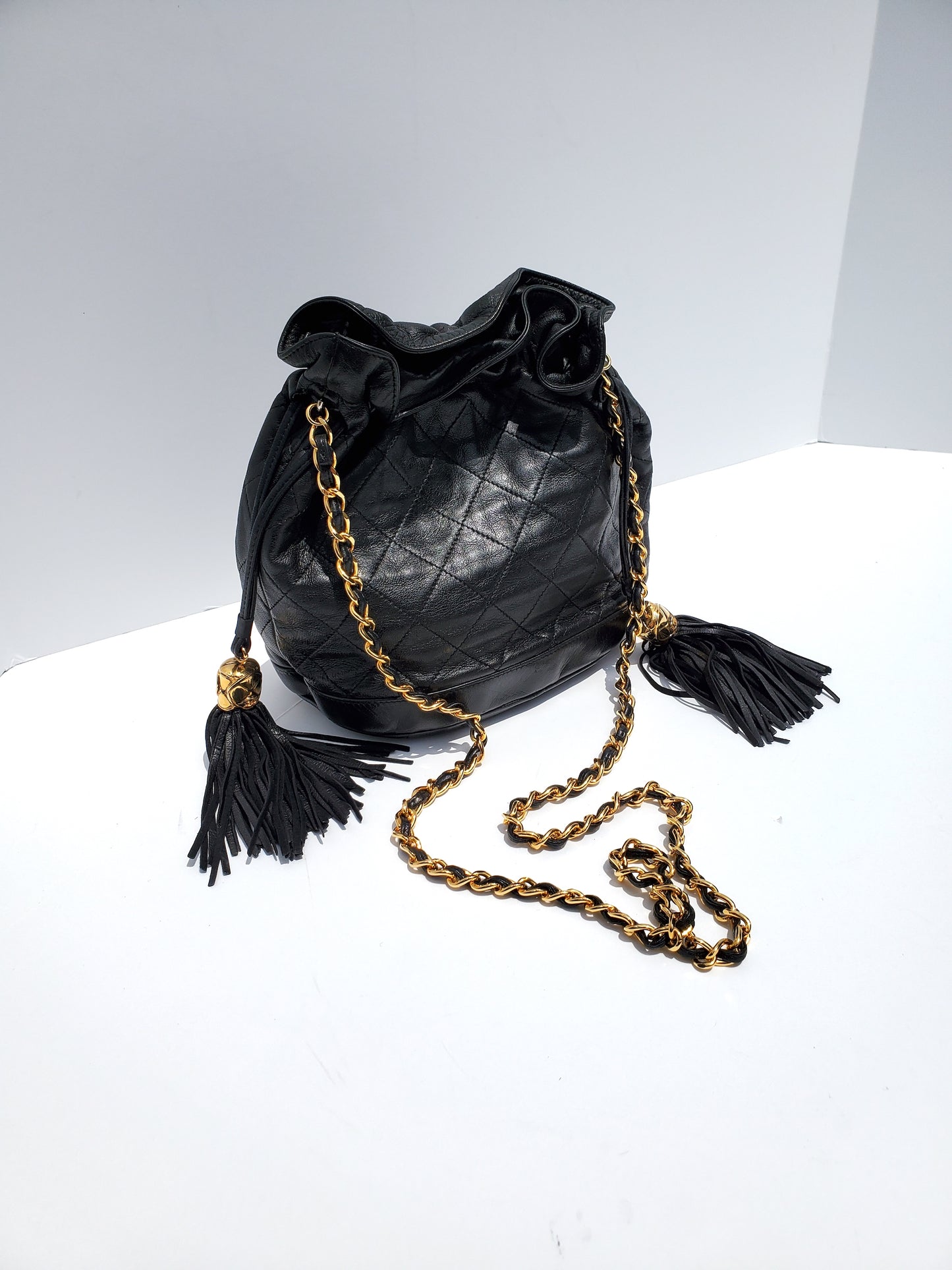 Vintage CHANEL 24k Gold Black Leather Quilted Bucket Bag