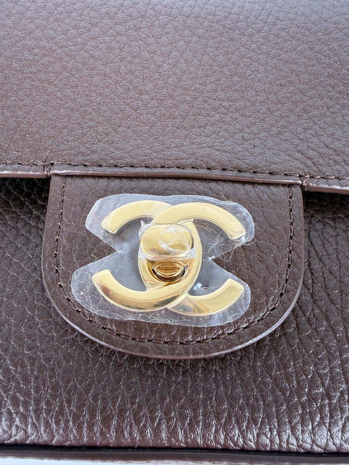 CHANEL Mini Souplissimo Flap Bag Brown Grained Calfskin Leather Gold Hardware Crossbody Bag