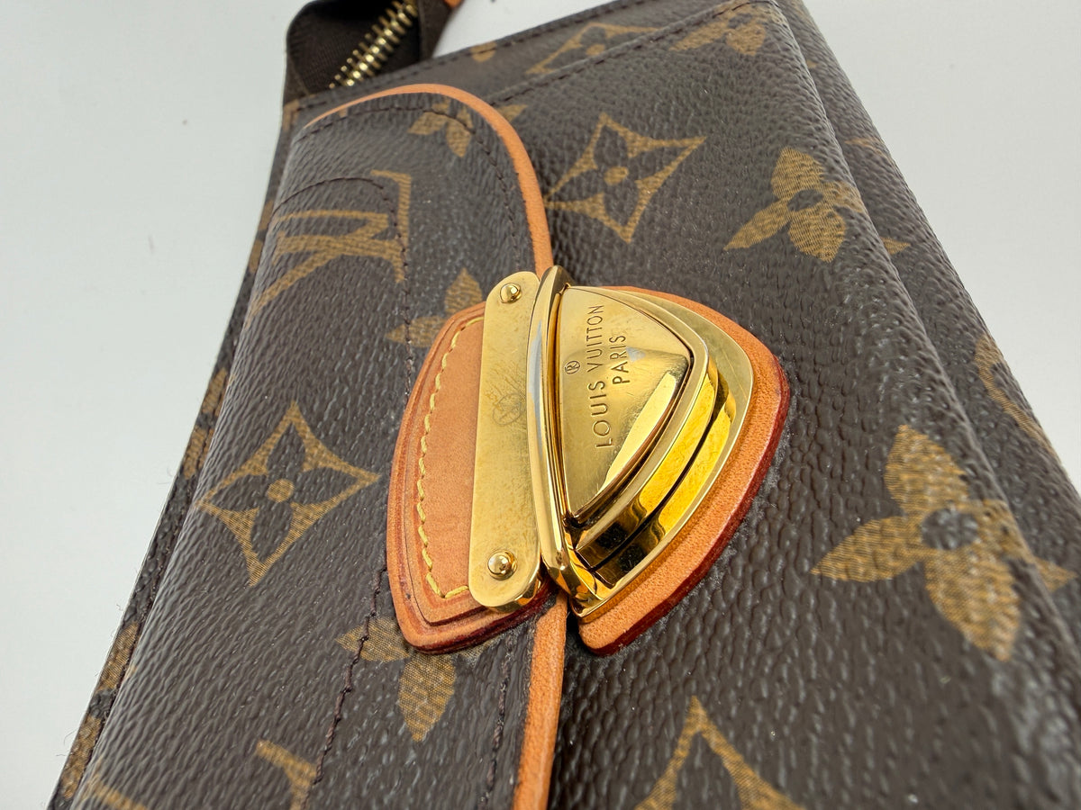 Louis Vuitton Astrid Monogram Brown Canvas Zip Wallet Wristlet