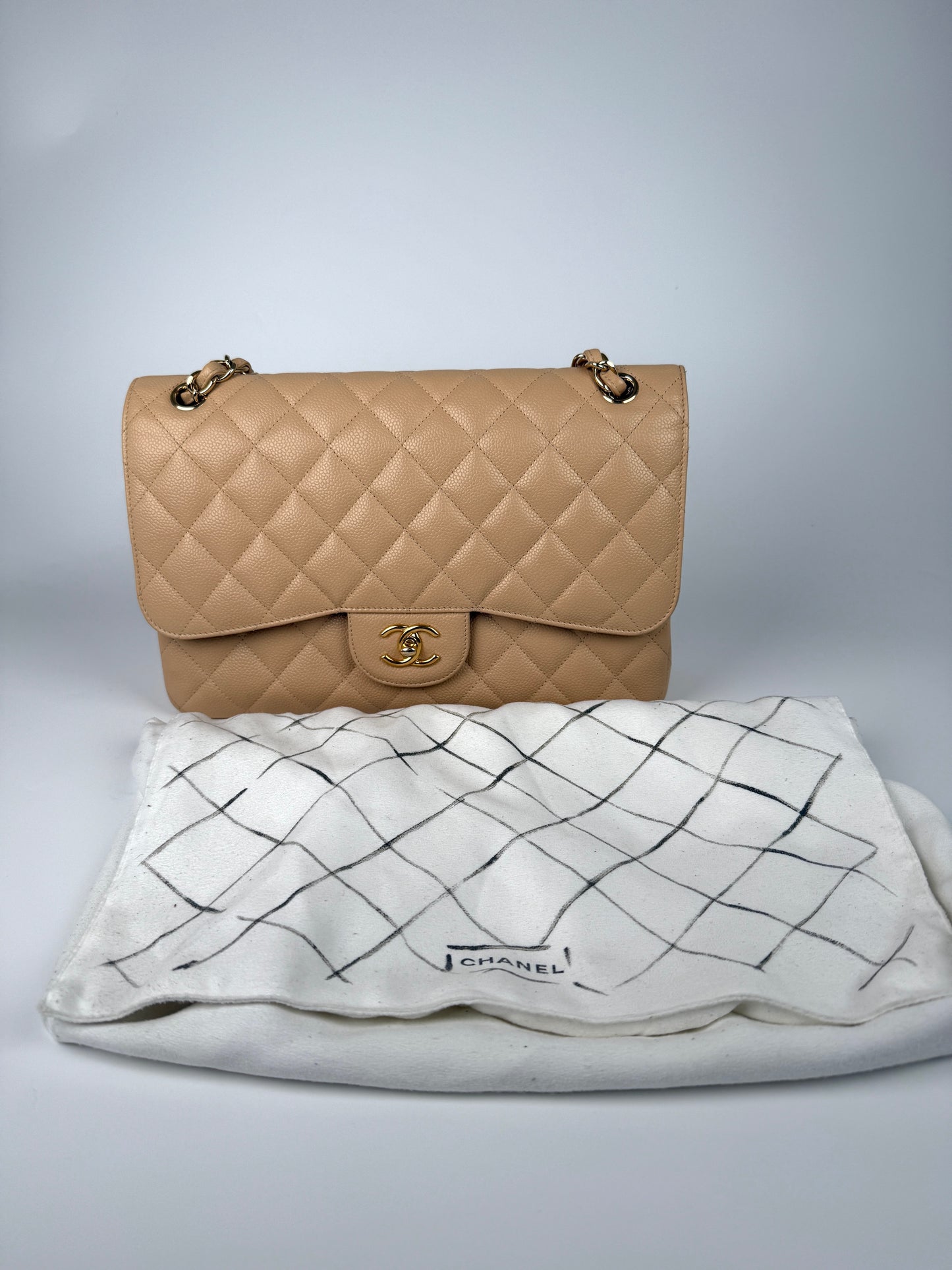 CHANEL Light Beige Caviar Jumbo Quilted Gold Hardware Classic Double Flap Bag