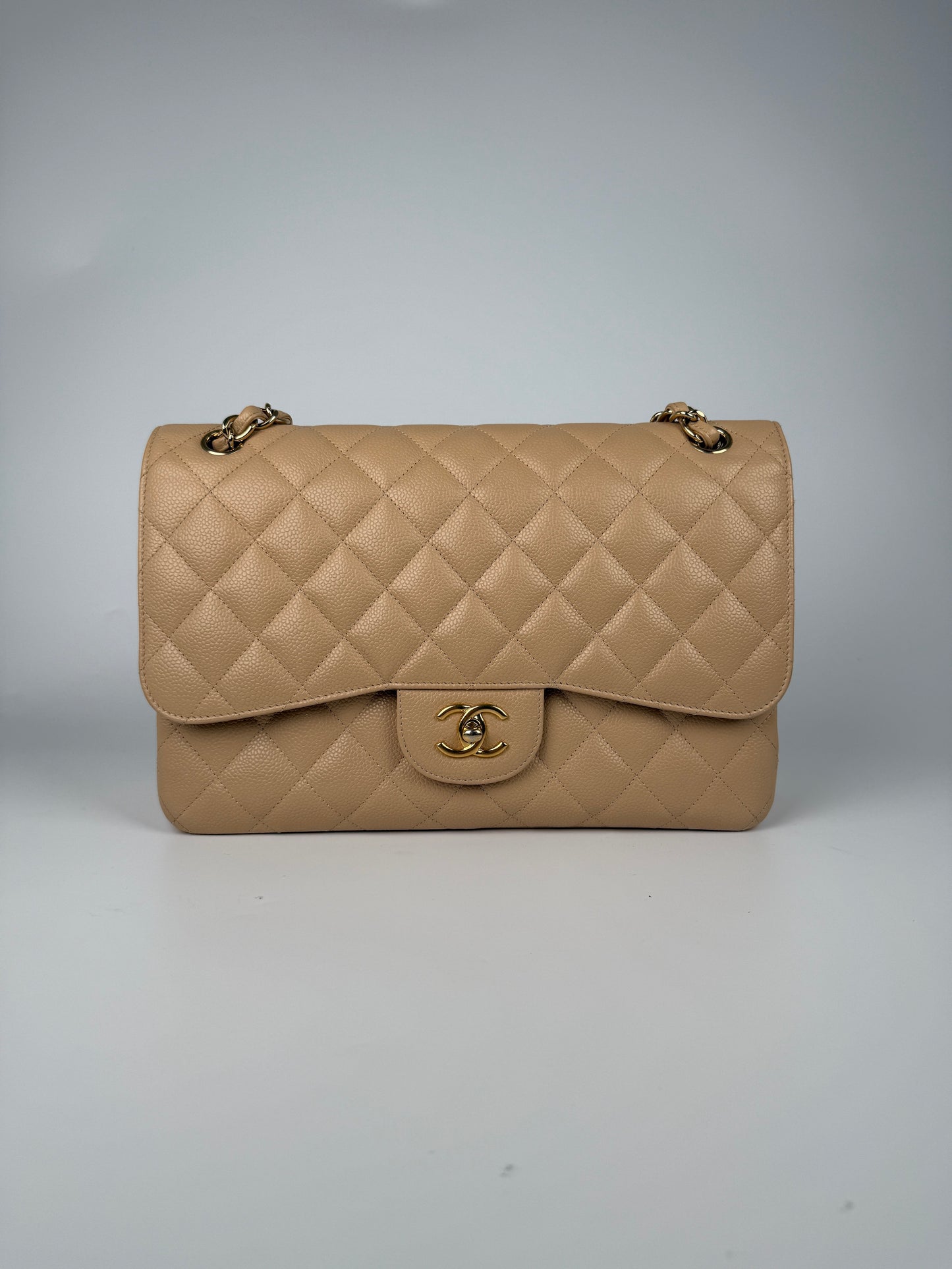 CHANEL Light Beige Caviar Jumbo Quilted Gold Hardware Classic Double Flap Bag
