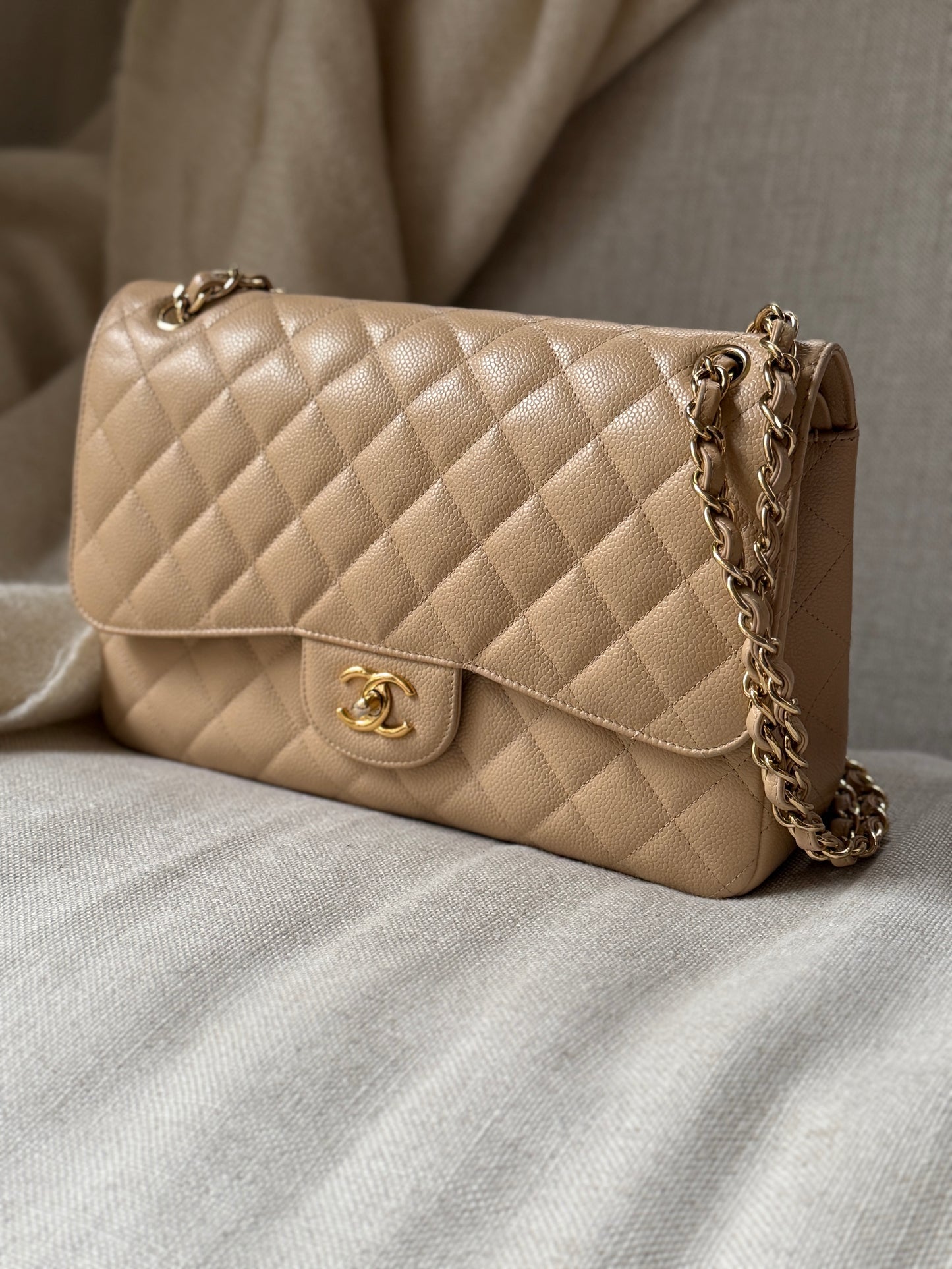 CHANEL Light Beige Caviar Jumbo Quilted Gold Hardware Classic Double Flap Bag