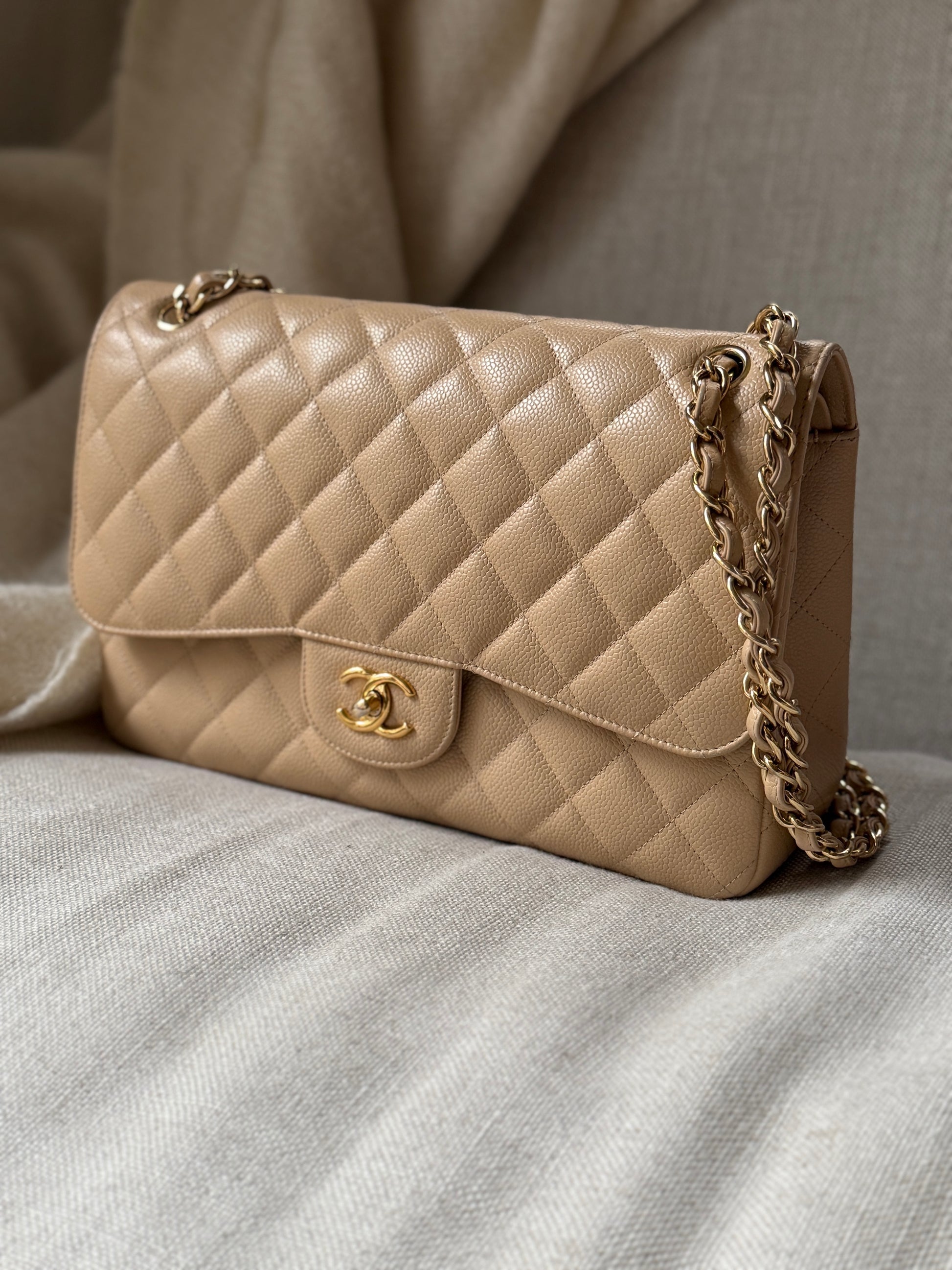 CHANEL Light Beige Caviar Jumbo Quilted Gold Hardware Classic Double Flap Bag