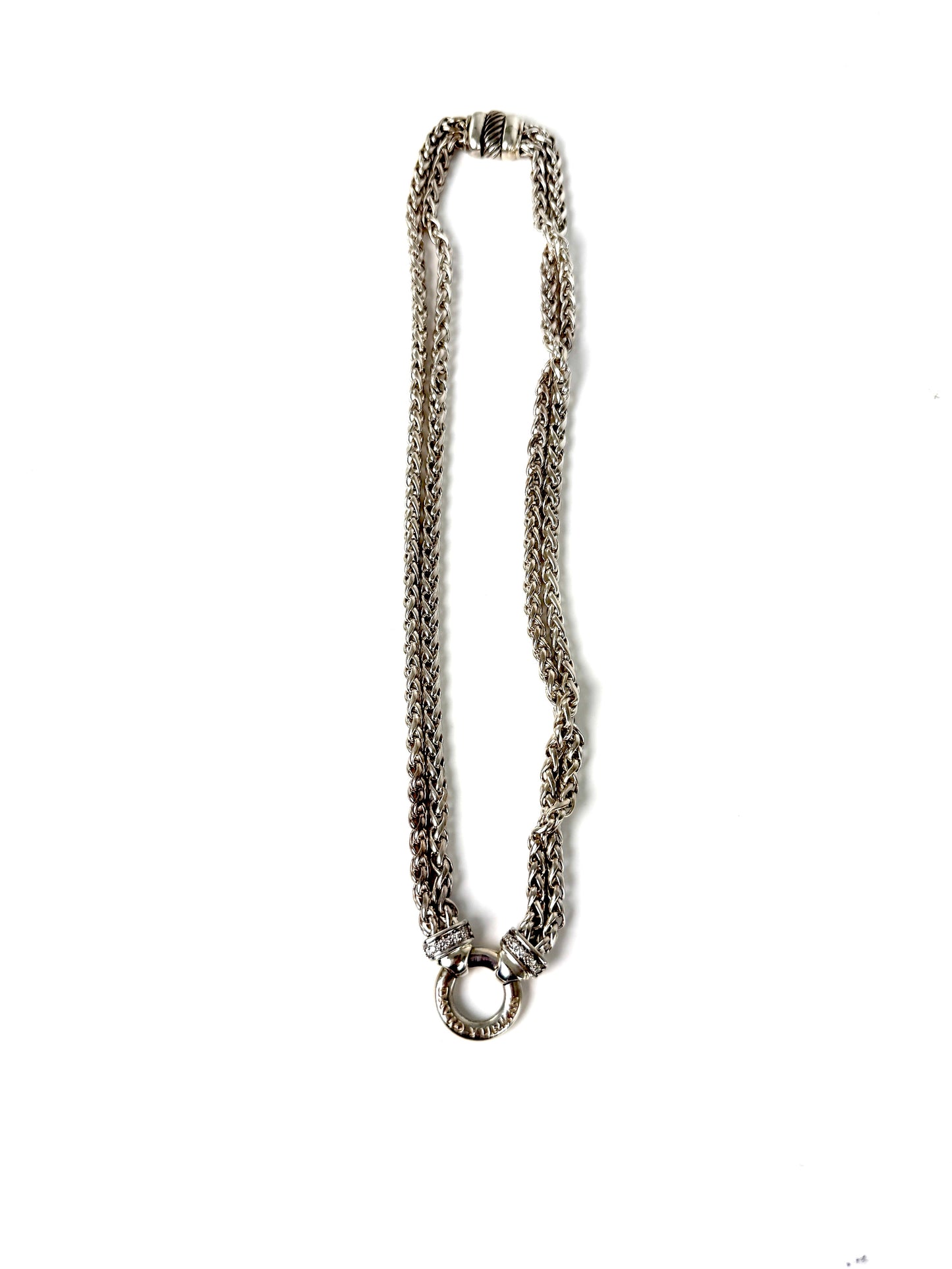 Designer: David Yurman
Length: 17”
Metal type: 925 sterling silver
Hallmark:  925, Designer signature
Item weight: 58g
Gemstone: 12 Diamonds, near colorless
Condition: Excellent. Light hairline scratches and discoloration at metal. Please see the photographs.
Inclusions: Pouch.
Retail price: $1350

Attach a DY Albion pendant to this necklace or wear it alone.  A classic piece of jewelry from David Yurman that will last for generations to come.

All items sold by Fashion Reloved are guaranteed authentic and 