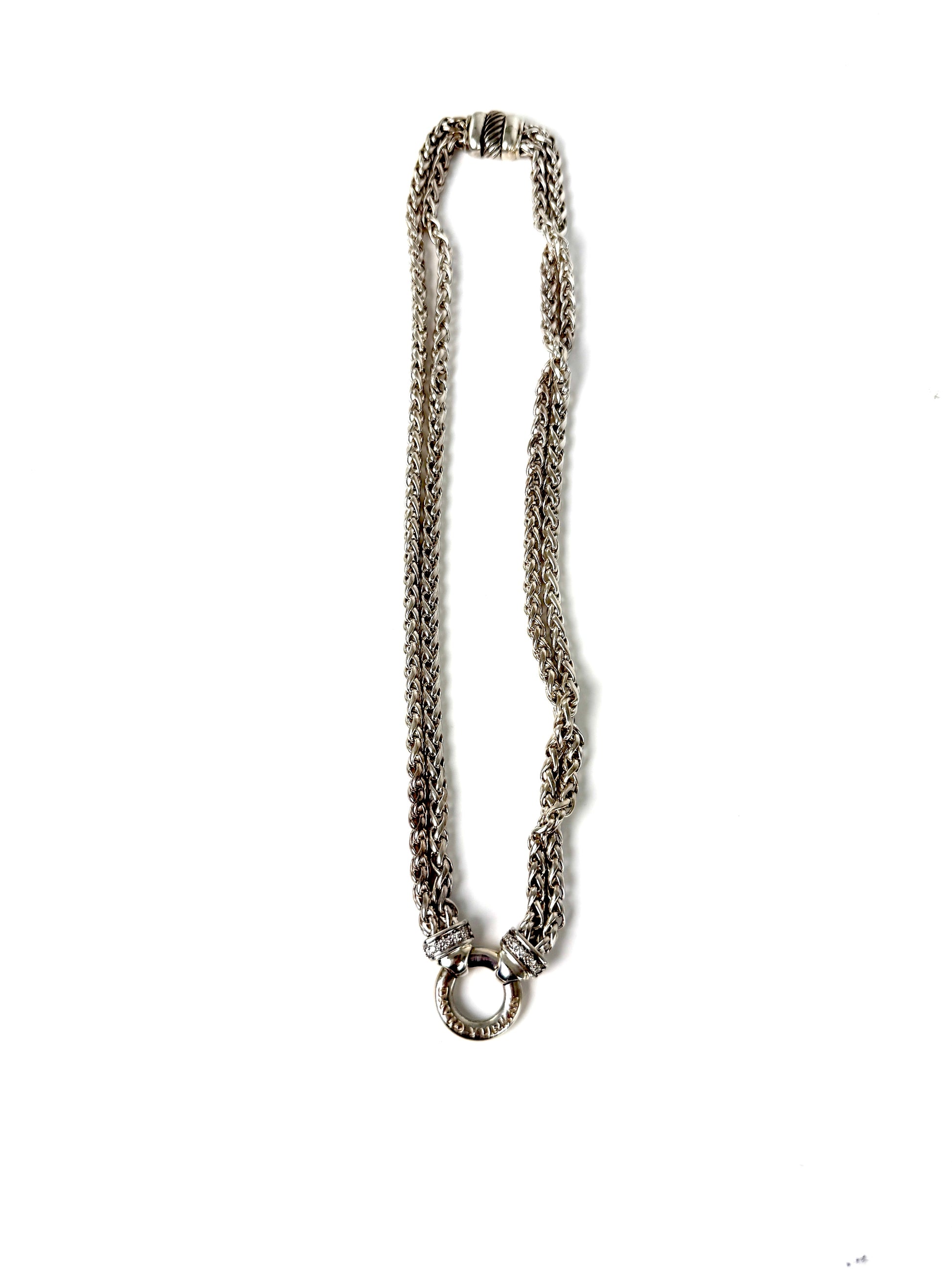 Designer: David Yurman
Length: 17”
Metal type: 925 sterling silver
Hallmark:  925, Designer signature
Item weight: 58g
Gemstone: 12 Diamonds, near colorless
Condition: Excellent. Light hairline scratches and discoloration at metal. Please see the photographs.
Inclusions: Pouch.
Retail price: $1350

Attach a DY Albion pendant to this necklace or wear it alone.  A classic piece of jewelry from David Yurman that will last for generations to come.

All items sold by Fashion Reloved are guaranteed authentic and 