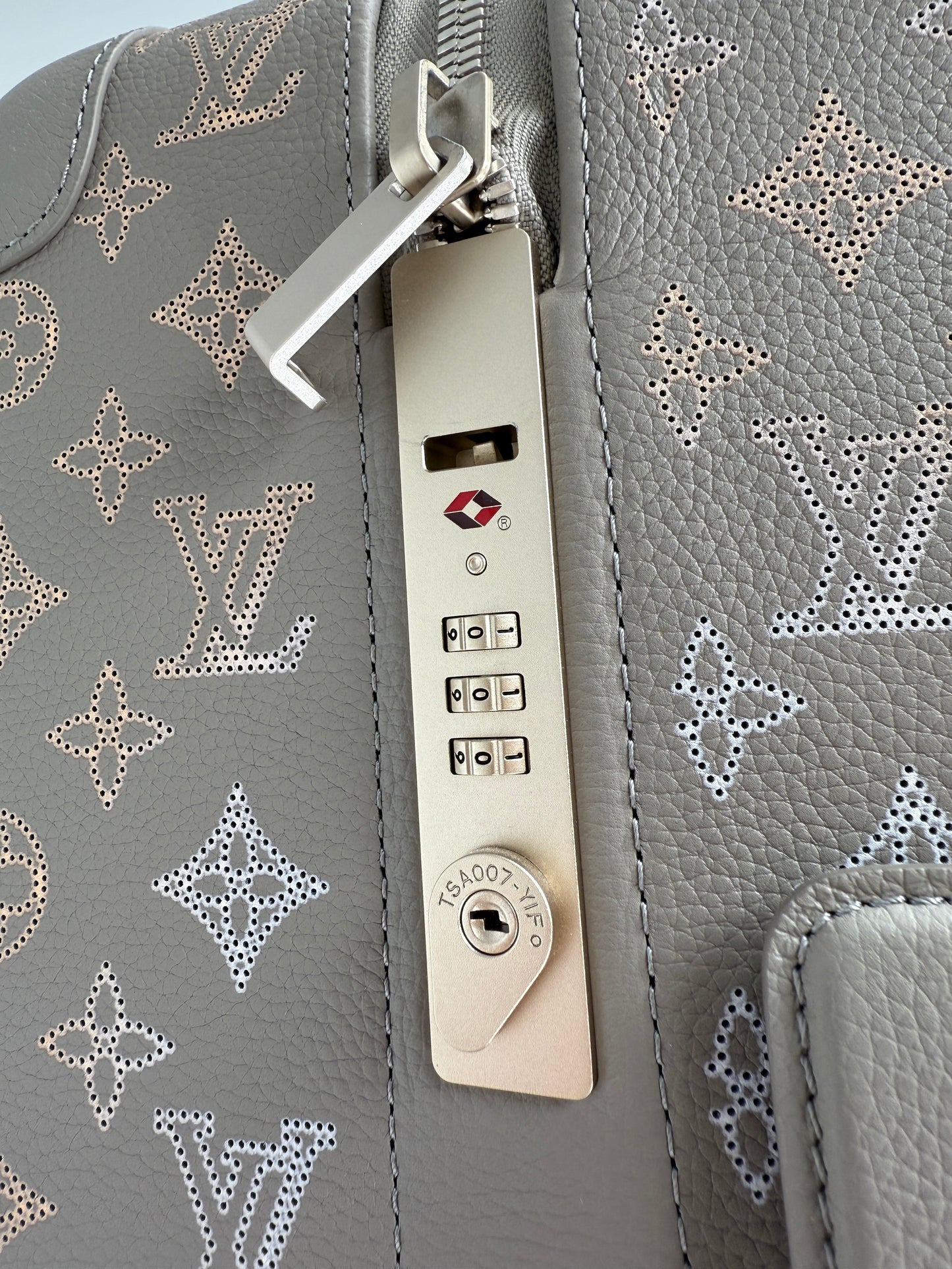 Louis Vuitton Horizon 55 Mahina Perforated Monogram Leather Suitcase