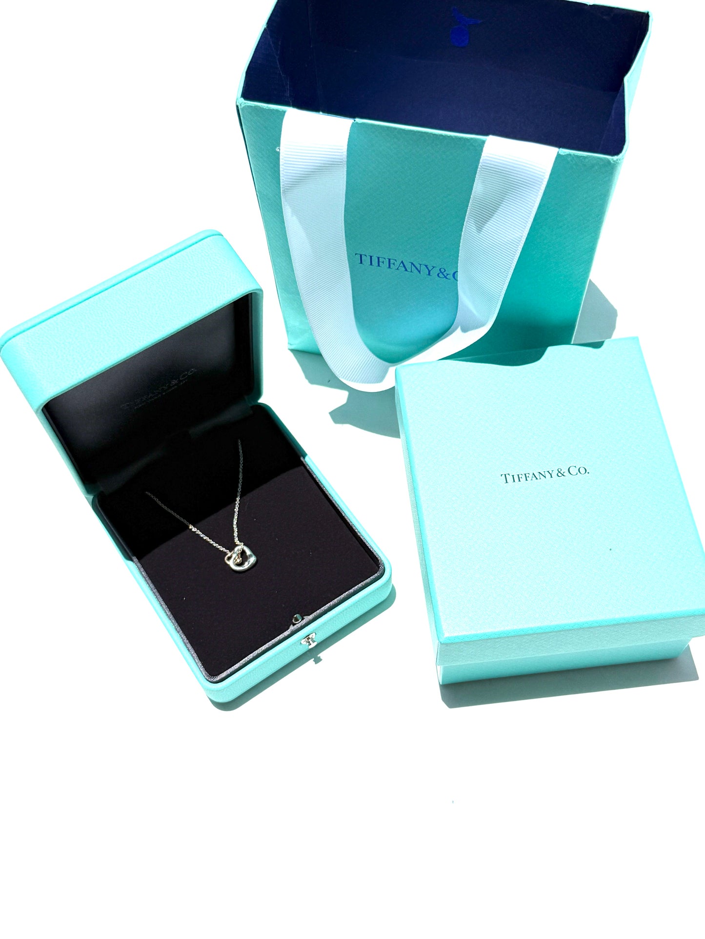 Tiffany & Co Elsa Peretti Open Heart Two Tone Sterling Silver and Gold Pendant Necklace