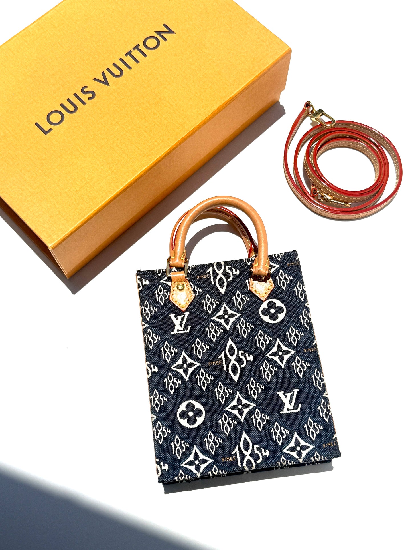 Louis Vuitton Since 1854 Petit Sac Plat Vertical Blue Canvas Monogram Crossbody Tote Bag