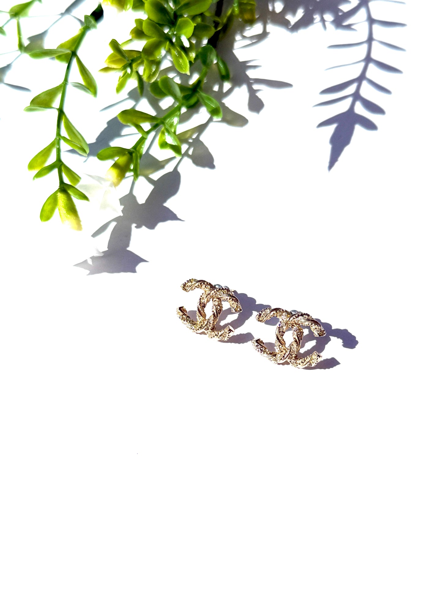 CHANEL CC Stud Light Gold Twisted Rhinestone Earrings
