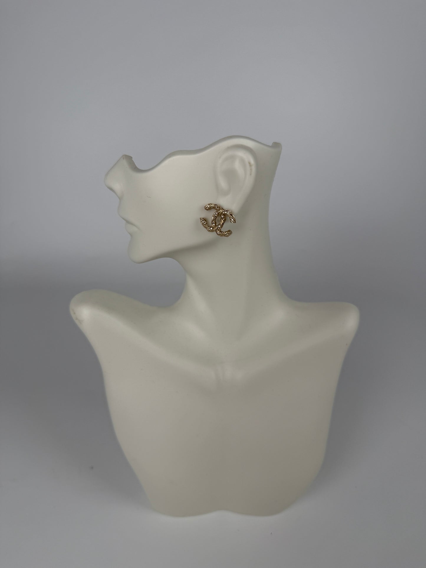 CHANEL CC Stud Light Gold Twisted Rhinestone Earrings
