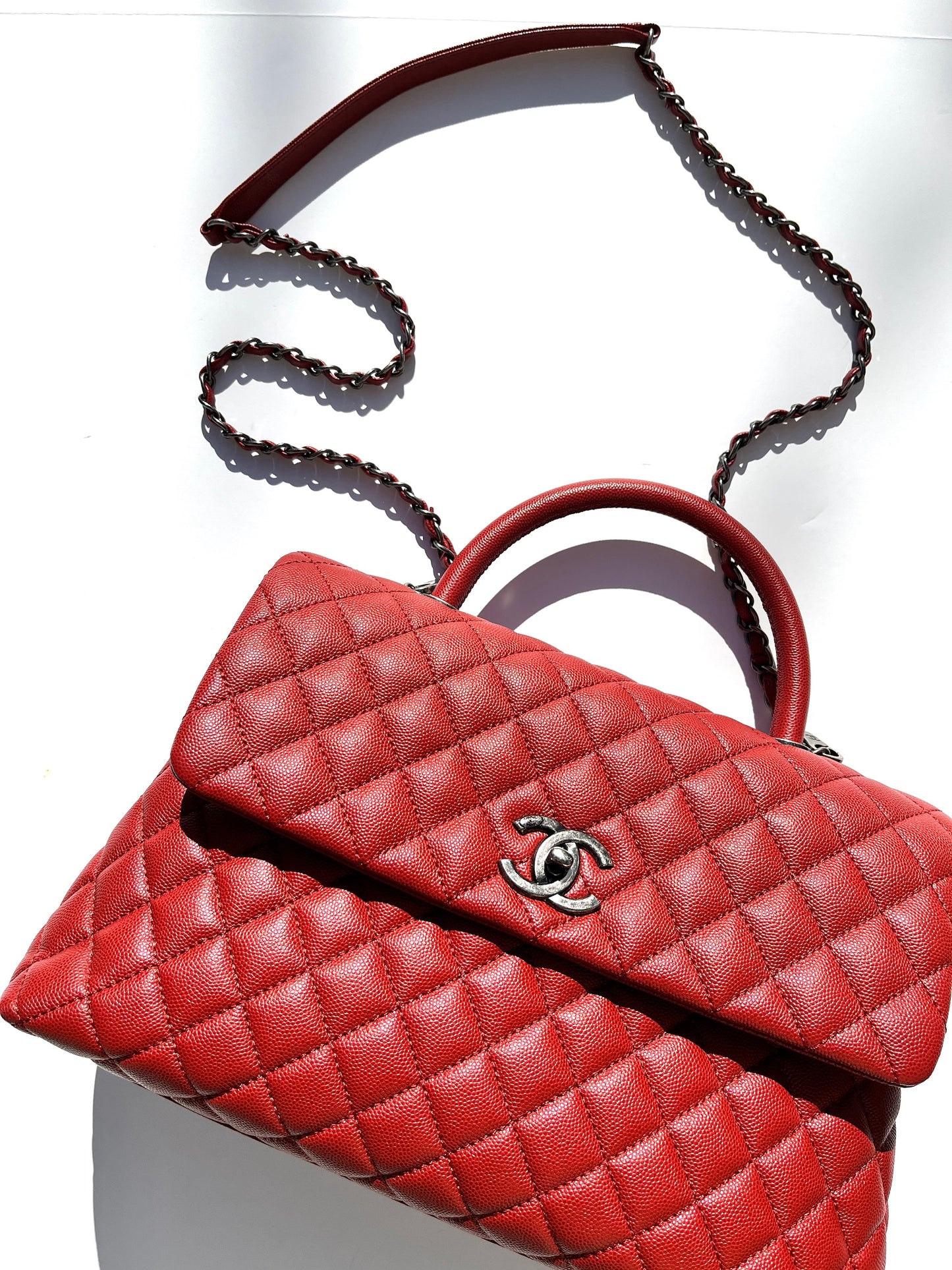 CHANEL Red Medium Coco Handle Top Handle Quilted Caviar Leather Bag