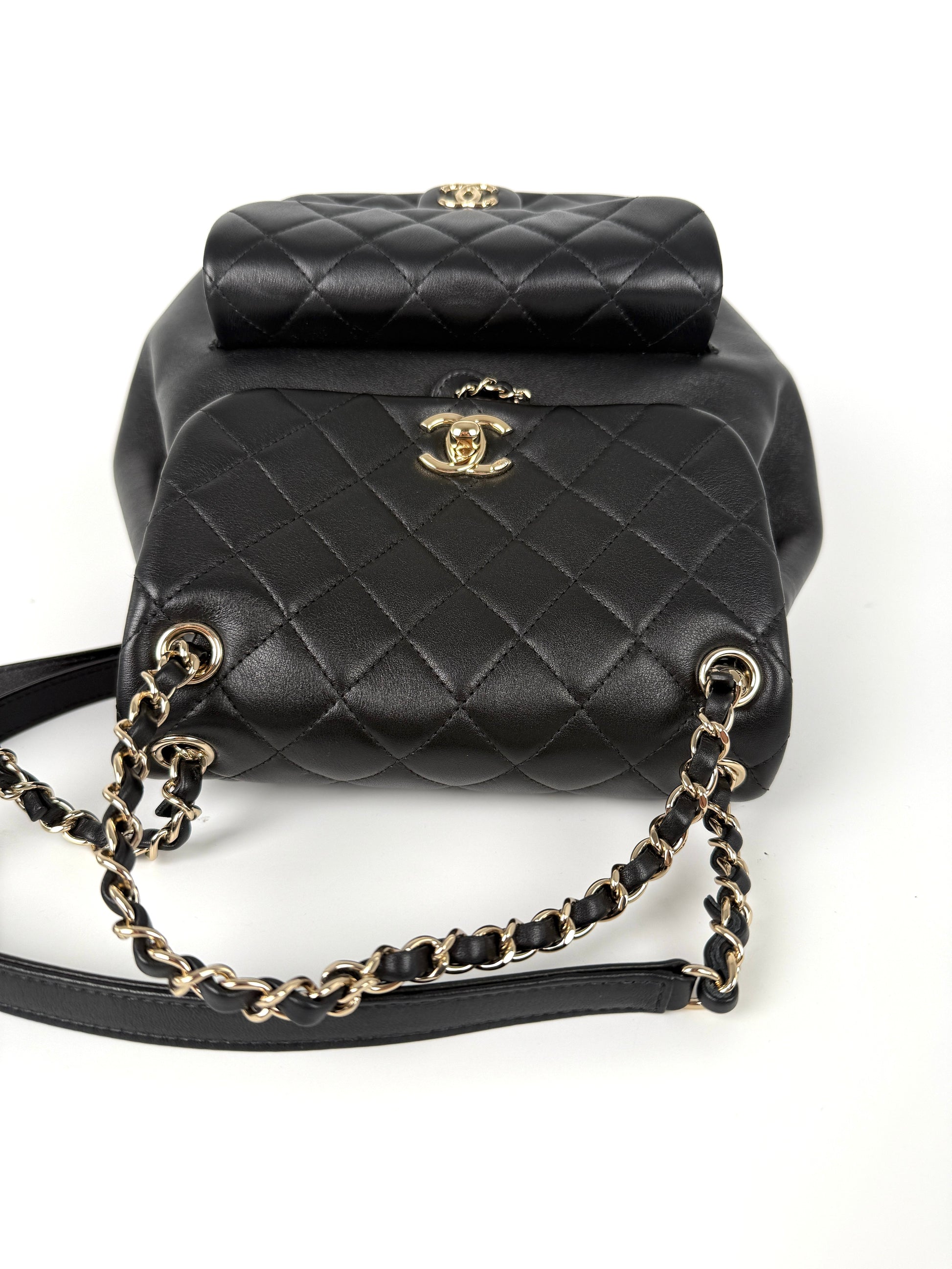 black quilted leather lettering charms backpack CHANEL Small Duma Black Quilted CC Leather Drawstring Backpack Bag – Fashion Reloved