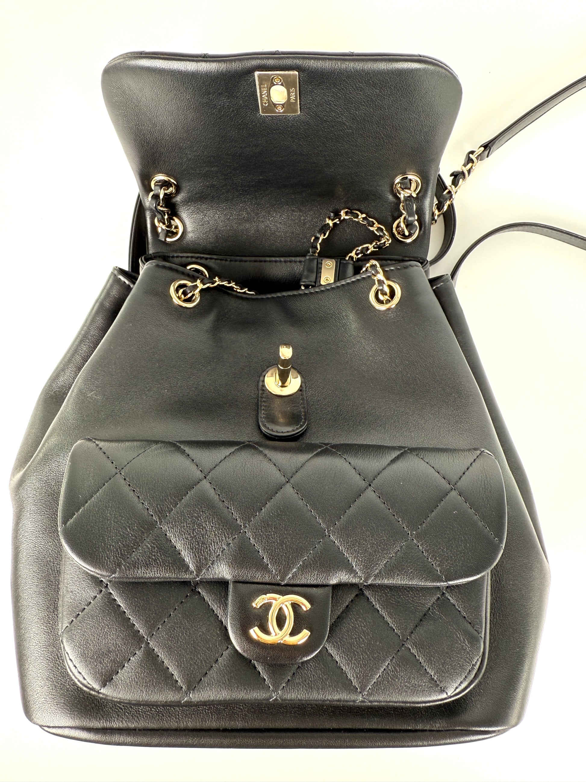 chanel leather black backpack CHANEL Small Duma Black Quilted CC Leather Drawstring Backpack Bag – Fashion Reloved
