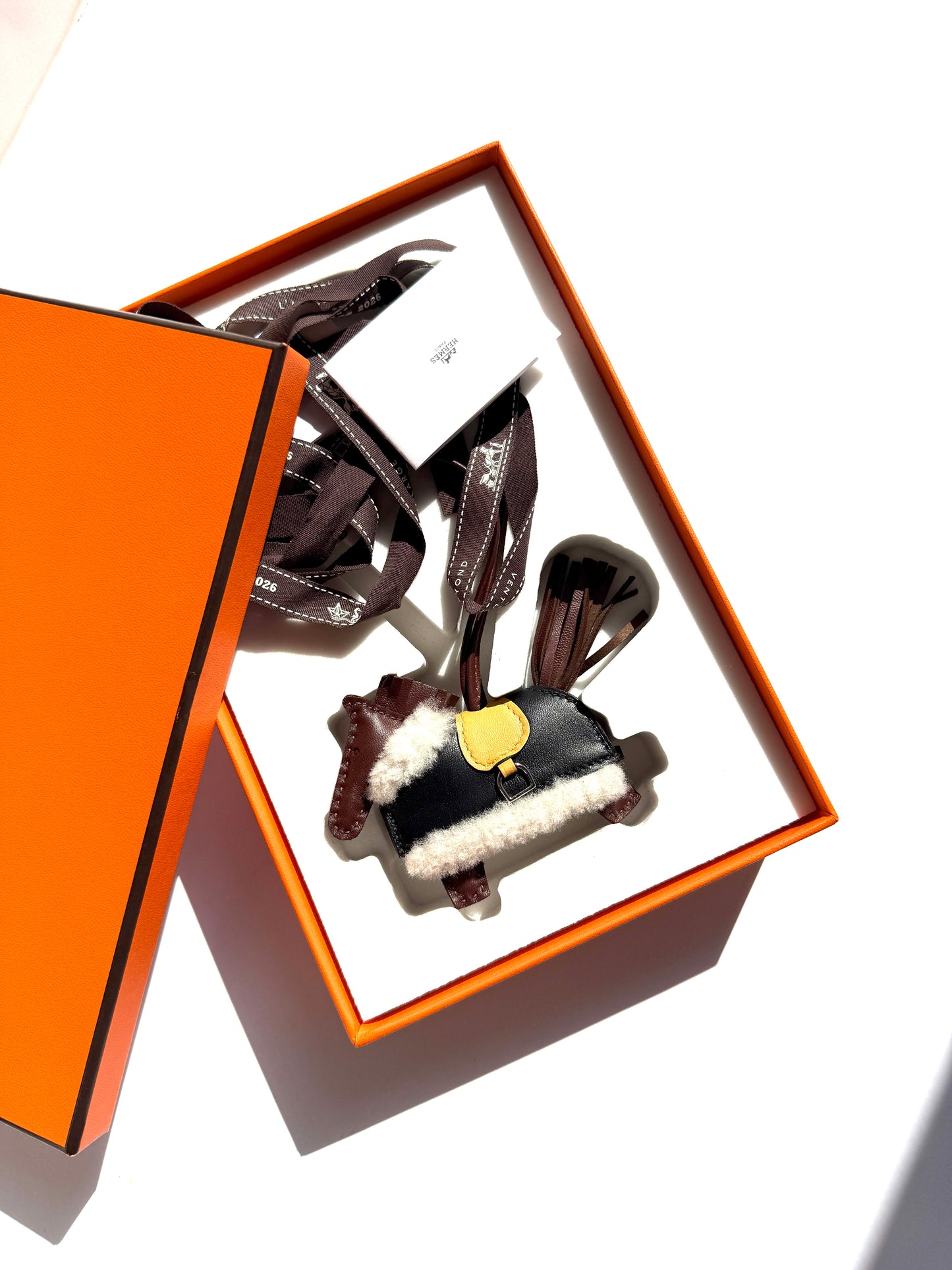 HERMES Rodeo Robeo Plush Charm PM Terre Paille Black Ecru Milo Lambskin and Wool Palladium Hardware New in box