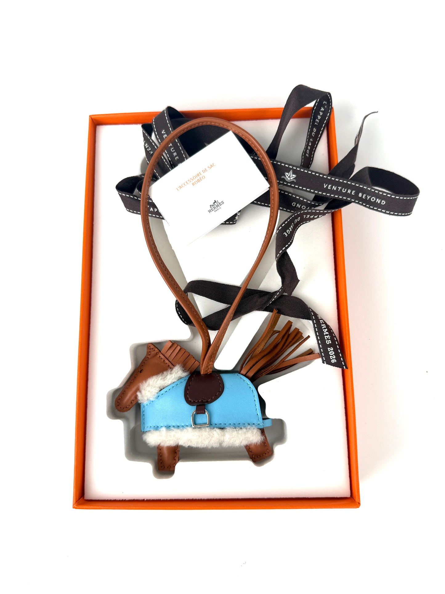 HERMES Rodeo Robeo Plush Charm PM Gold Terre Celeste Ecru  Milo Lambskin and Wool Palladium Hardware New in box