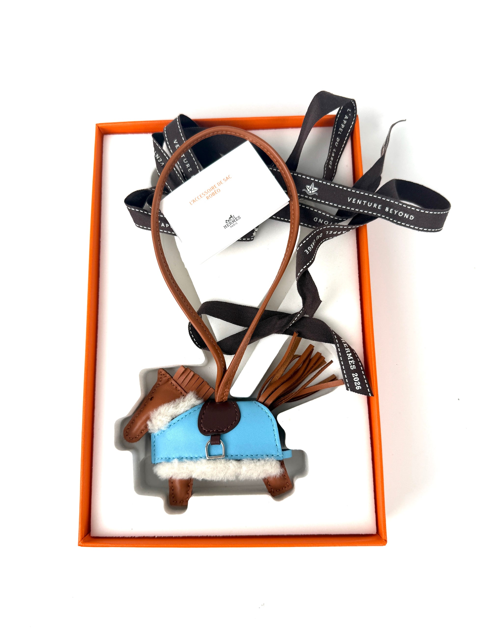 HERMES Rodeo Robeo Plush Charm PM Gold Terre Celeste Ecru  Milo Lambskin and Wool Palladium Hardware New in box