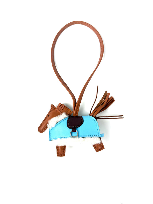 HERMES Rodeo Robeo Plush Charm PM Gold Terre Celeste Ecru  Milo Lambskin and Wool Palladium Hardware New in box