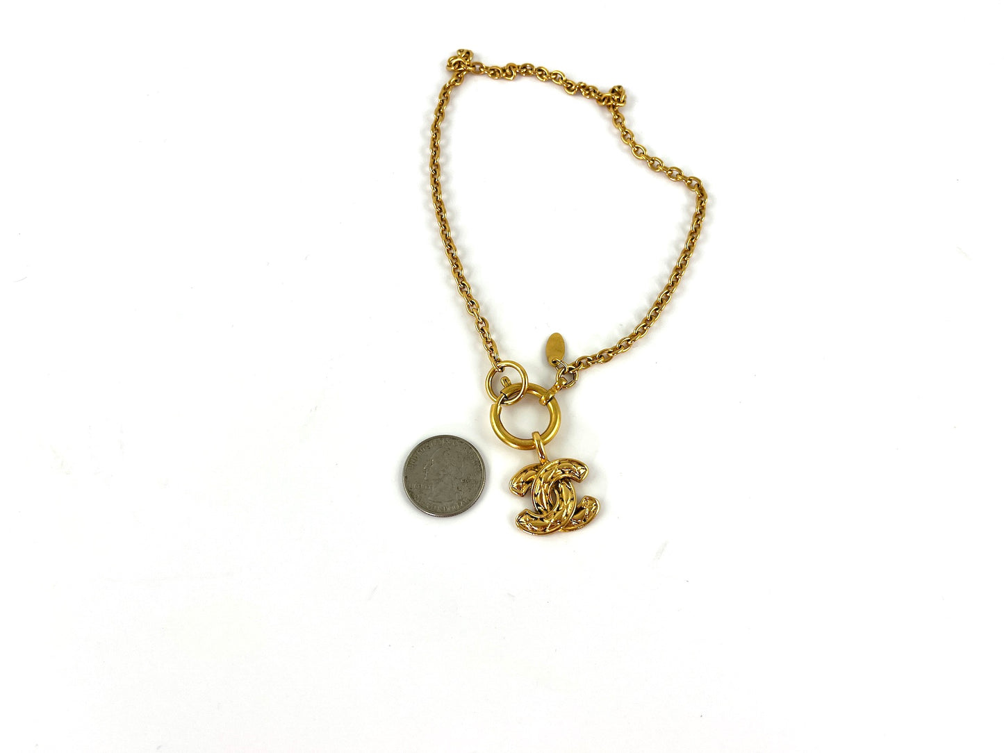 Vintage CHANEL Gold 1990’s Quilted CC Pendant Necklace