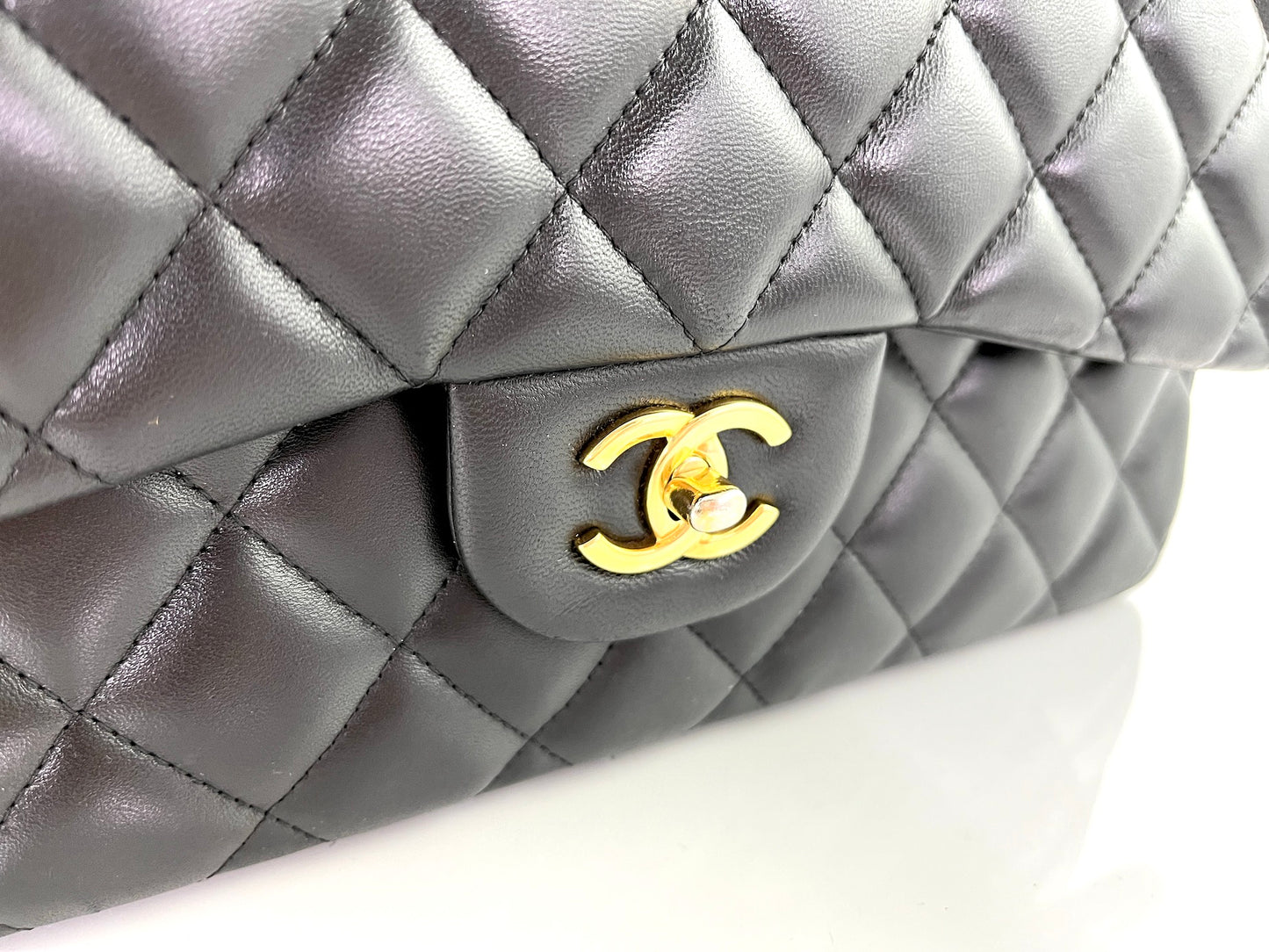 CHANEL Black Lambskin Jumbo Quilted Gold Hardware Classic Double Flap Bag